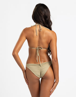 MODEL IS WEARING A TORTUGA TRIANGLE TOP WITH MATCHING SKIMPY BOTTOM
TOP HAS 2 TORTOISE RINGS ON EACH STRAP
TOP TIES AT NECK AND BACK
BACK VIEW